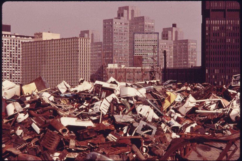 The Pittsburgh skyline with a pile of trash in the foreground, 1974.