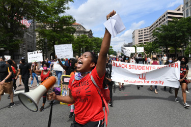 Black Students Matter demonstrators march through Washington, D.C., June 19, 2020