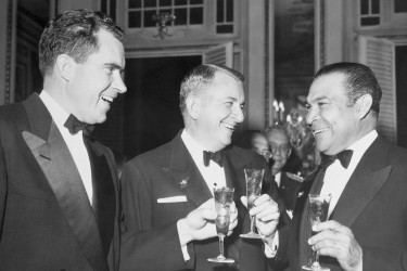 Fulgencio Batista, Andrés Domingo, and Richard Nixon drinking together.