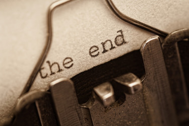 Paper in a typewriter, with the words "the end" just typed.
