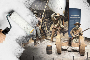 A person white washing over a Texan Independence exhibit.