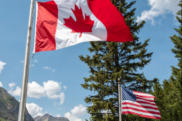 The Canadian and American flags.