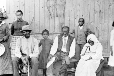 Harriet Tubman with family at her home in Auburn, NY circa 1885.