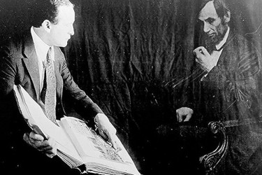 Houdini and a ghostly image of Lincoln.
