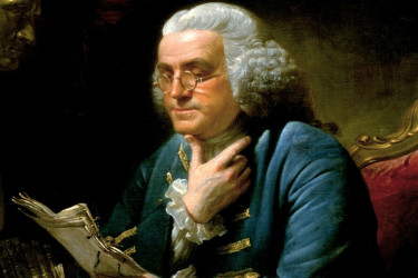 Portrait of Benjamin Franklin reading.