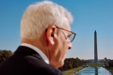 David Rubenstein looks toward the Washington Monument.