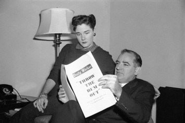 Jean and Joseph McCarthy reading the Daily Worker.