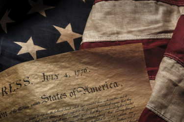 Declaration of Independence and American flag.
