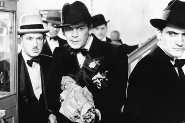 A movie still from Scarface (1932) depicting members of the mafia.