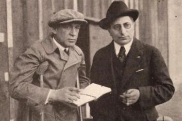Director Edwin Carewe and studio owner Louis B. Mayer on a film set.