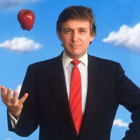 A young Donald Trump tosses an apple into the air.