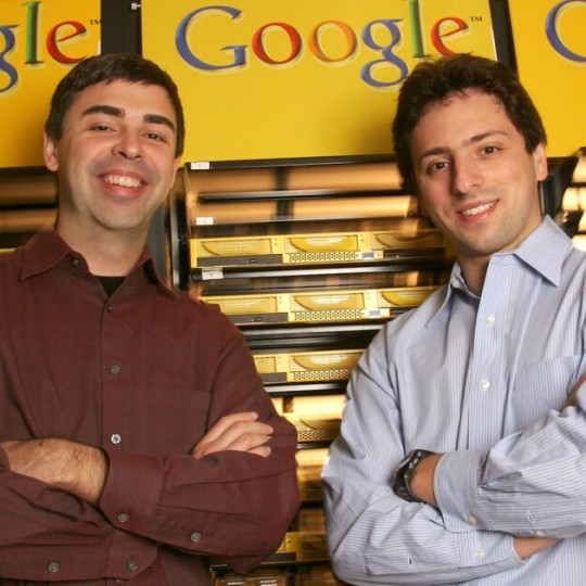 Larry Page and Sergey Brin in front of Google's servers.