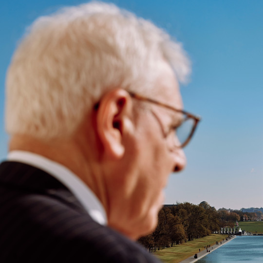 David Rubenstein looks toward the Washington Monument.