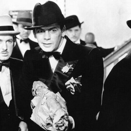 A movie still from Scarface (1932) depicting members of the mafia.