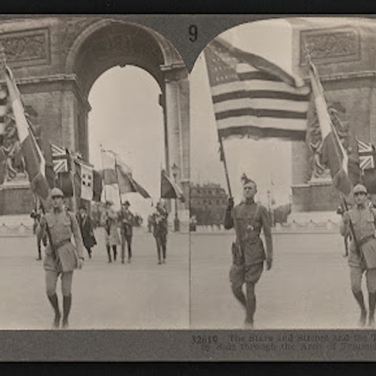 The Stars and Stripes and the Tricolor March Side by Side Through the Arch of Triumph, Paris, Sept. 19, 1927