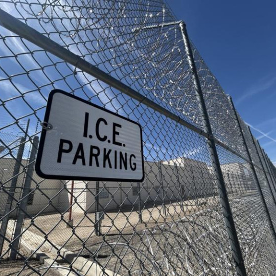 I.C.E. Parking Sign on a gate of a detention center.