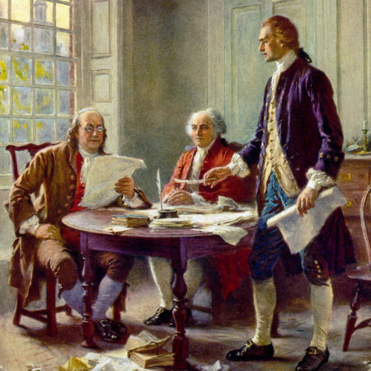 Painting of Benjamin Franklin, John Adams, and Thomas Jefferson of the Committee of Five work on drafting the Declaration.