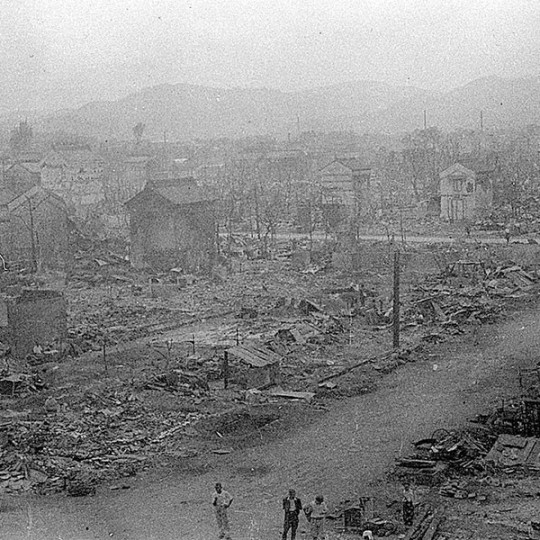 Black and white photograph of a town destroyed by firebombs.