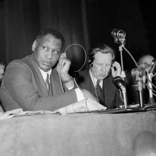 Paul Robeson listens to a speech during the Peace Partisans World Congress in Moscow on April 20, 1949.