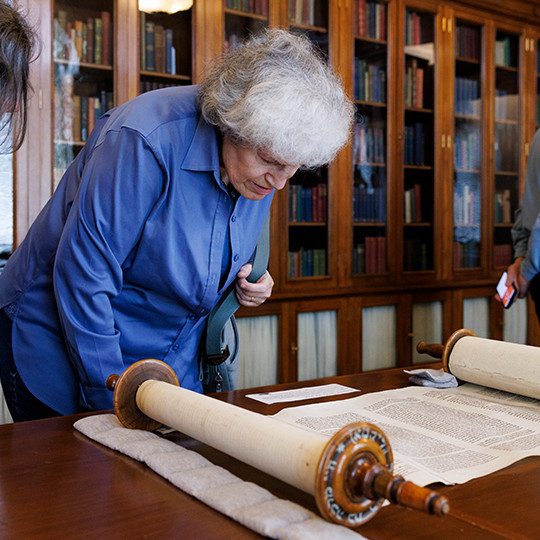 Visitors look over items from the Library's collections relating to Jewish life in Colonial America after a speech by Laura Arnold Leibman.