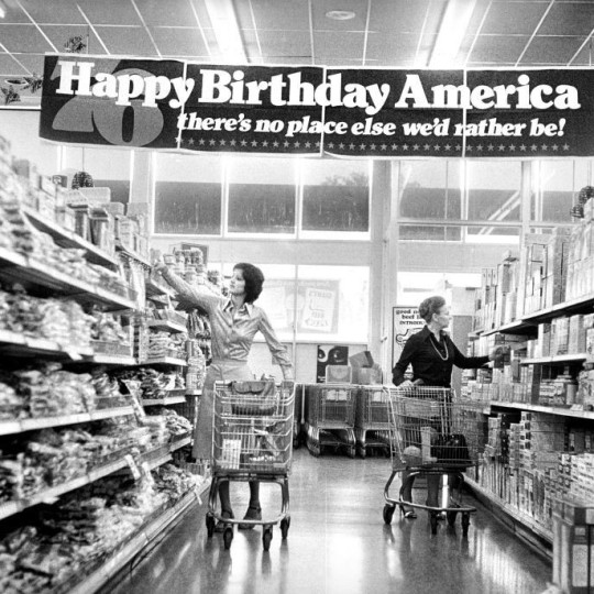 1976, bicentennial celebration banner in a grocery store.