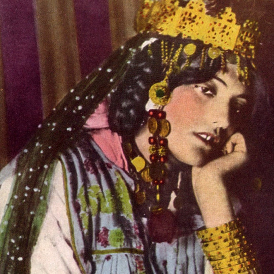A National Geographic magazine photograph of an Algerian woman.