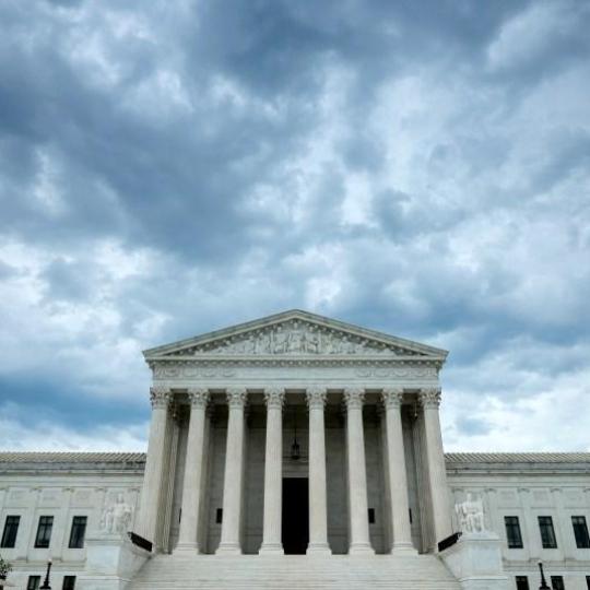Rain clouds roll over the United States Supreme Court building on June 18, 2026 in Washington, DC.