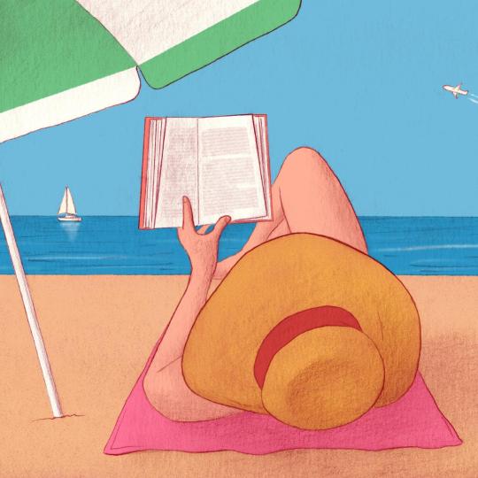 Woman reading on a beach.