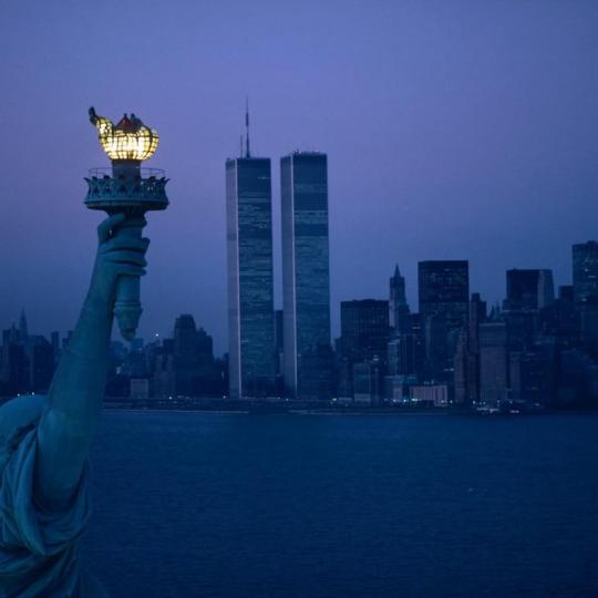 New York skyline featuring the World Trade Center towers.