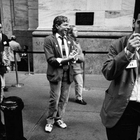 Traders take a break outside the New York Stock Exchange in 1988