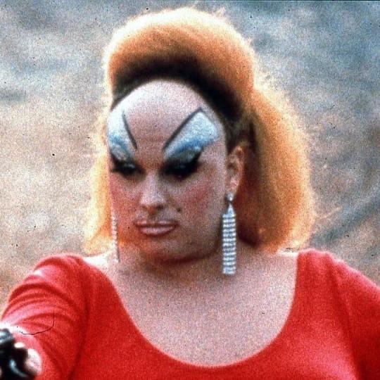 Drag queen holding a gun, from the film 