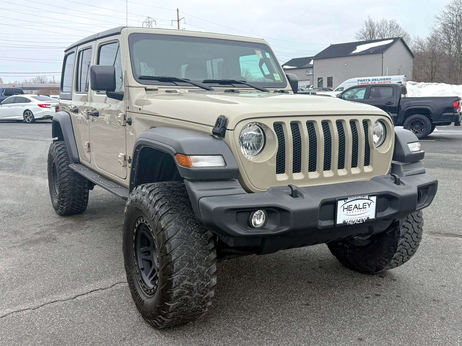 Photo view of 2022 Jeep Wrangler in Tan