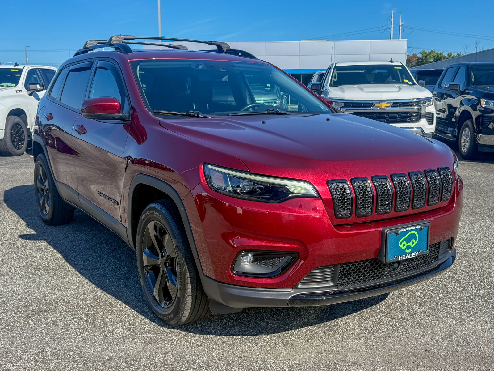 Photo view of 2021 Jeep Cherokee in Red