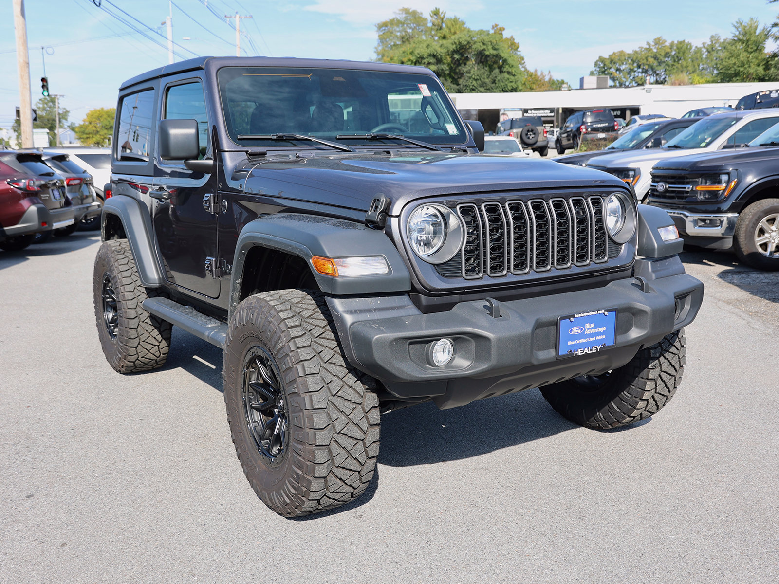 Photo view of 2025 Jeep Wrangler in Gray