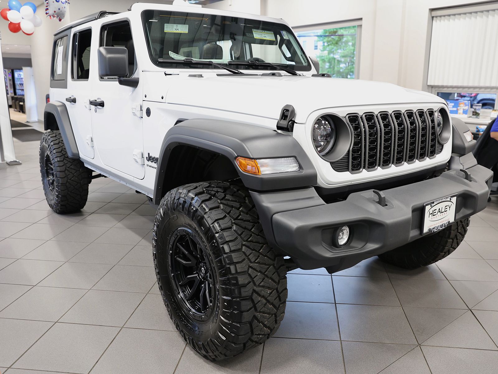 Photo view of 2026 Jeep Wrangler in White