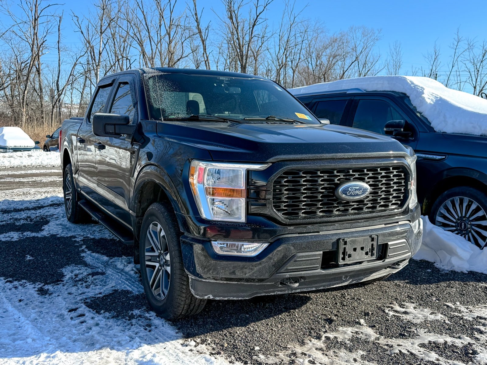 Photo view of 2021 Ford F-150 in Black