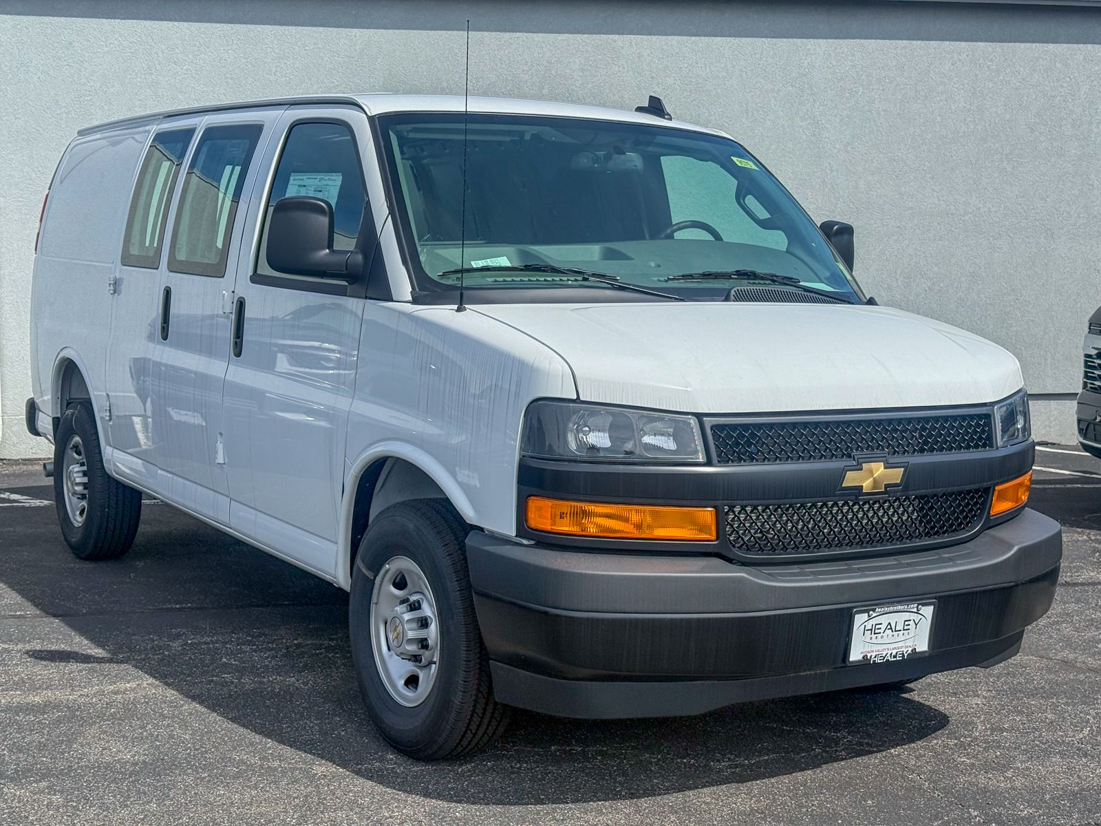Photo view of 2025 Chevrolet Express Cargo Van in White