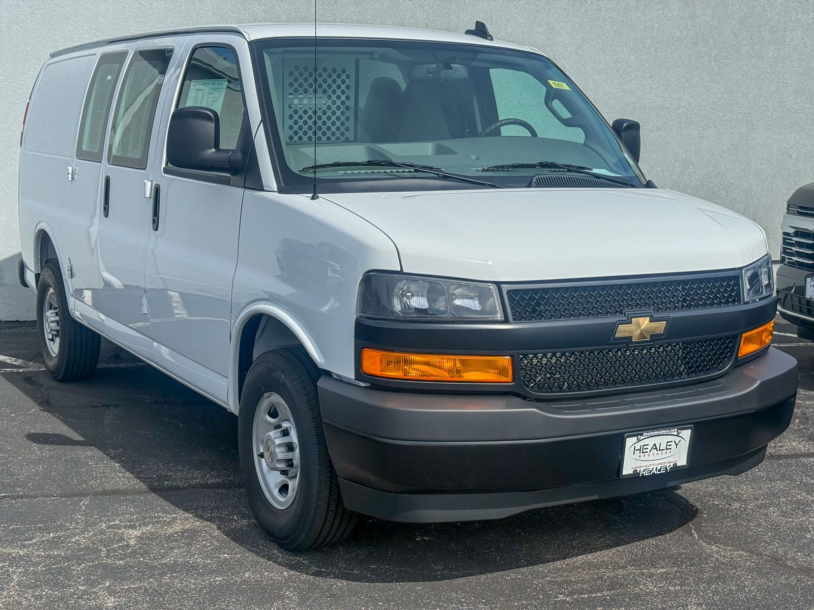 Photo view of 2025 Chevrolet Express Cargo Van in White