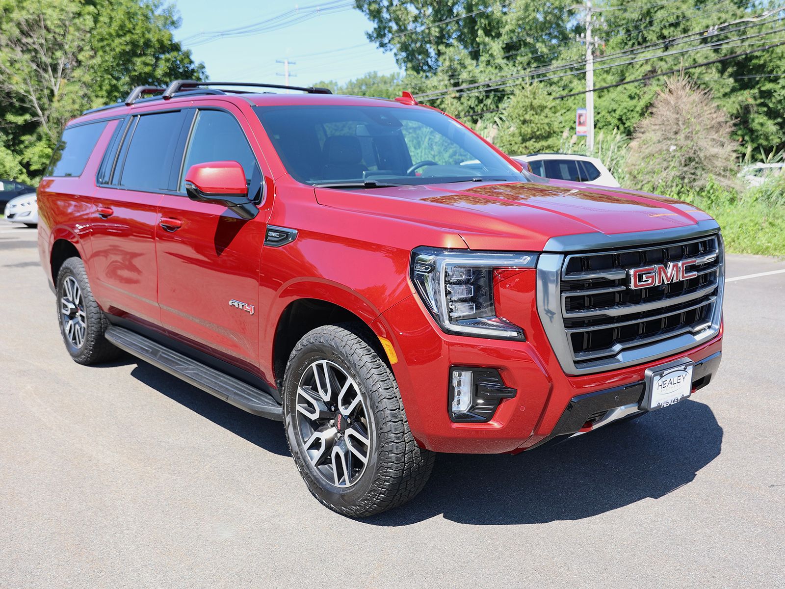 Photo view of 2024 GMC Yukon XL in Red