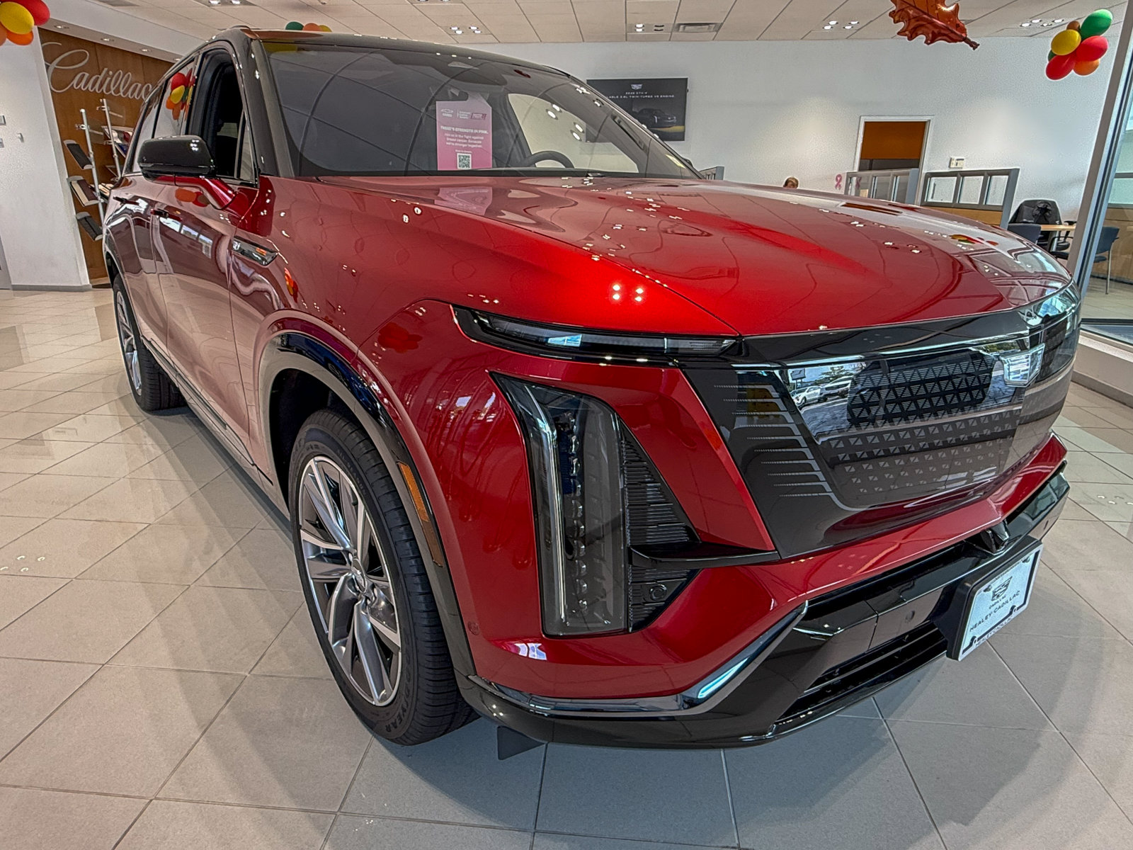 Photo view of 2027 Cadillac VISTIQ in Red