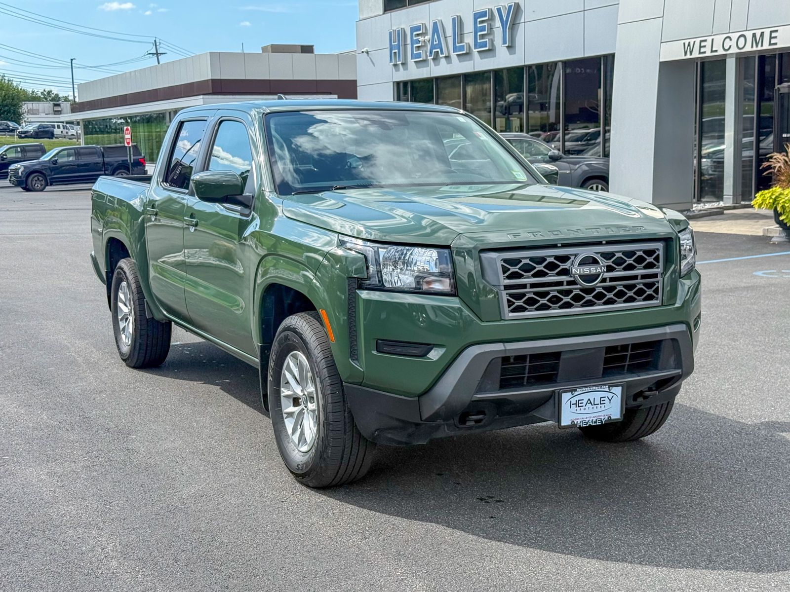 Photo view of 2024 Nissan Frontier in Green