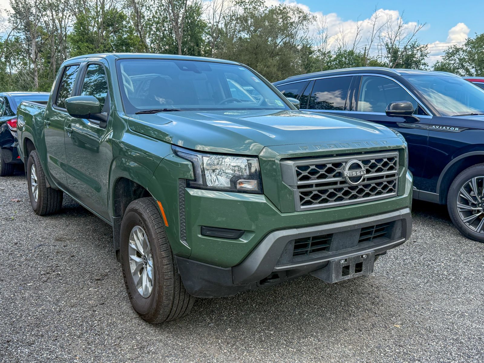 Photo view of 2024 Nissan Frontier in Green