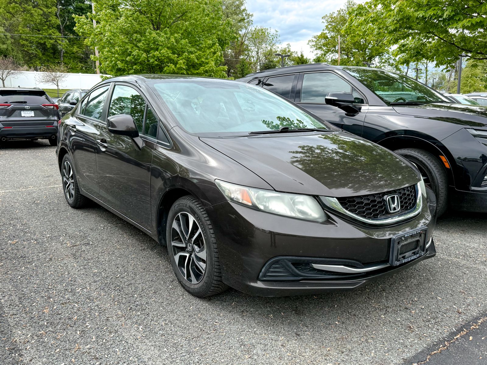 Photo view of 2013 Honda Civic Sedan in Brown