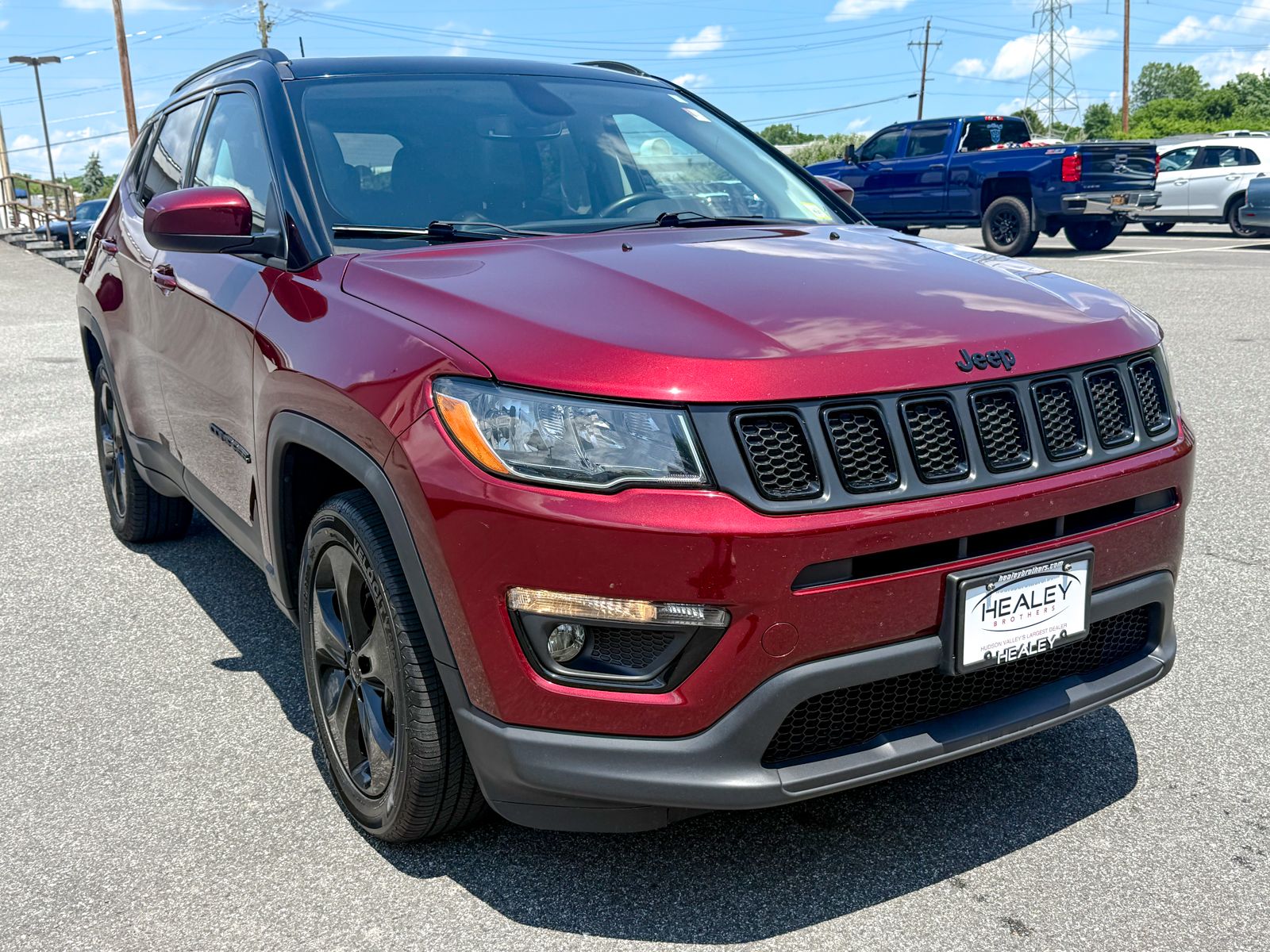 Photo view of 2021 Jeep Compass in Red
