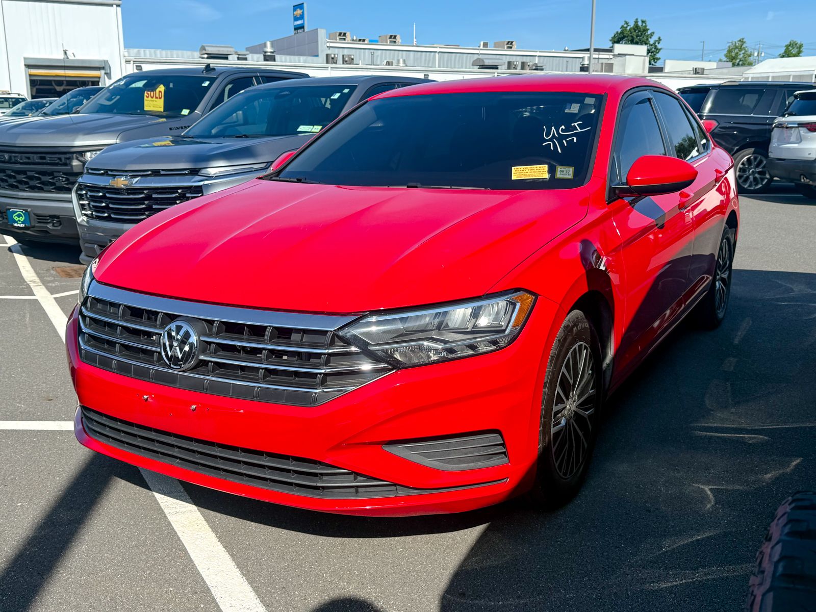 Photo view of 2021 Volkswagen Jetta in Red