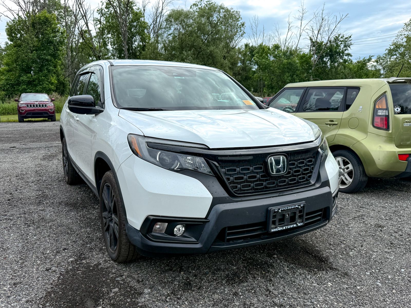 Photo view of 2021 Honda Passport in White