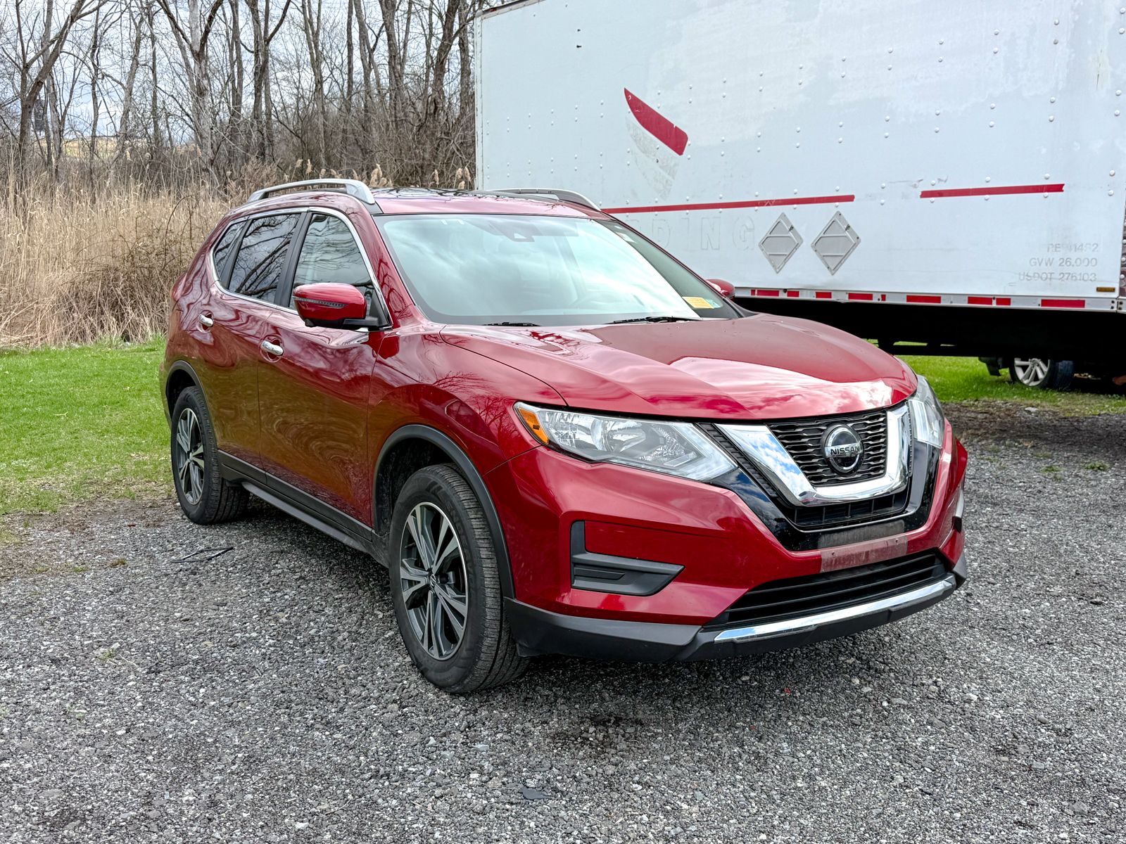 Photo view of 2019 Nissan Rogue in Red