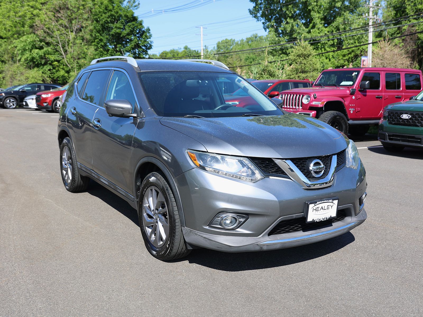 Photo view of 2016 Nissan Rogue in Gray
