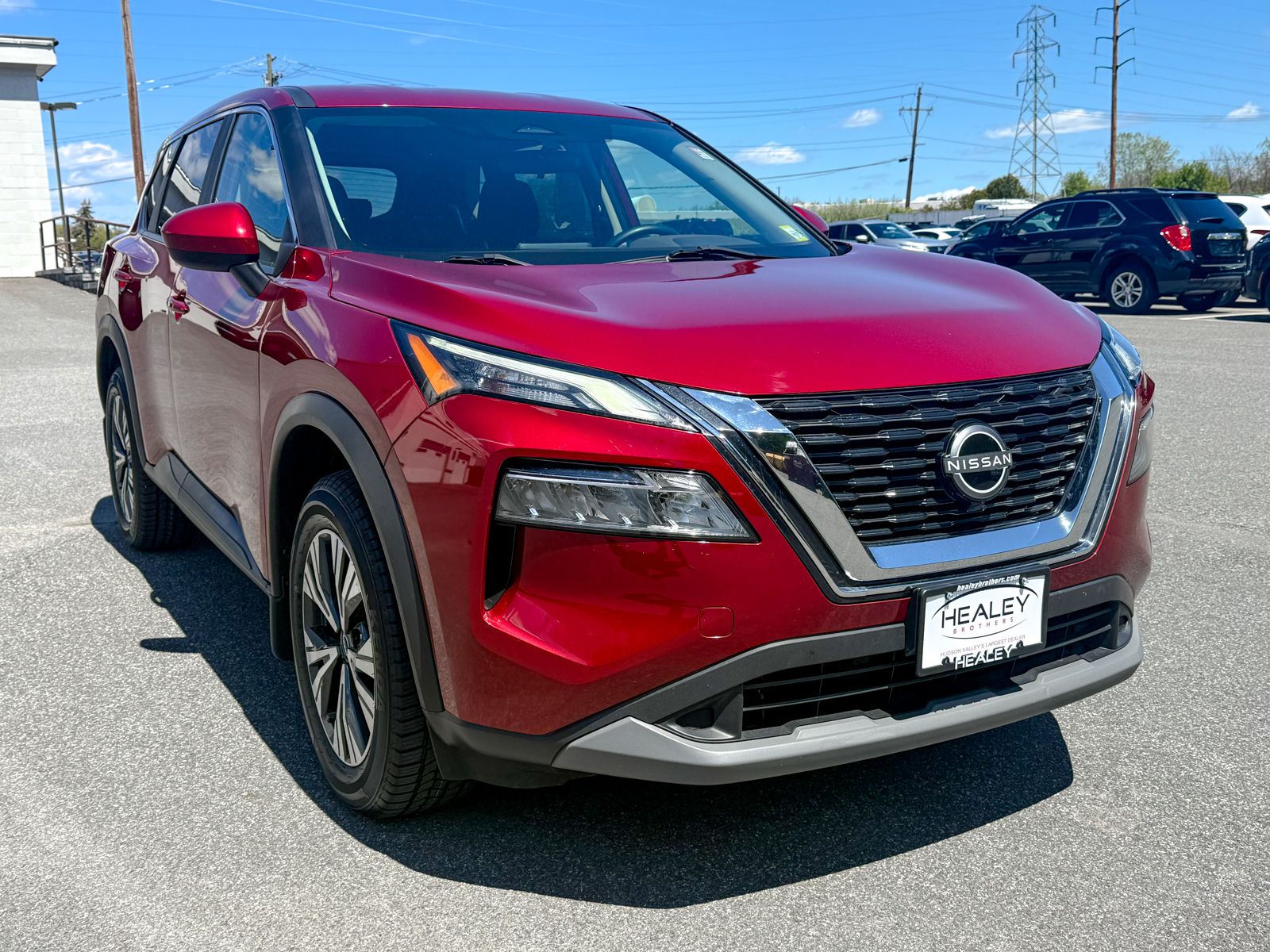 Photo view of 2023 Nissan Rogue in Red