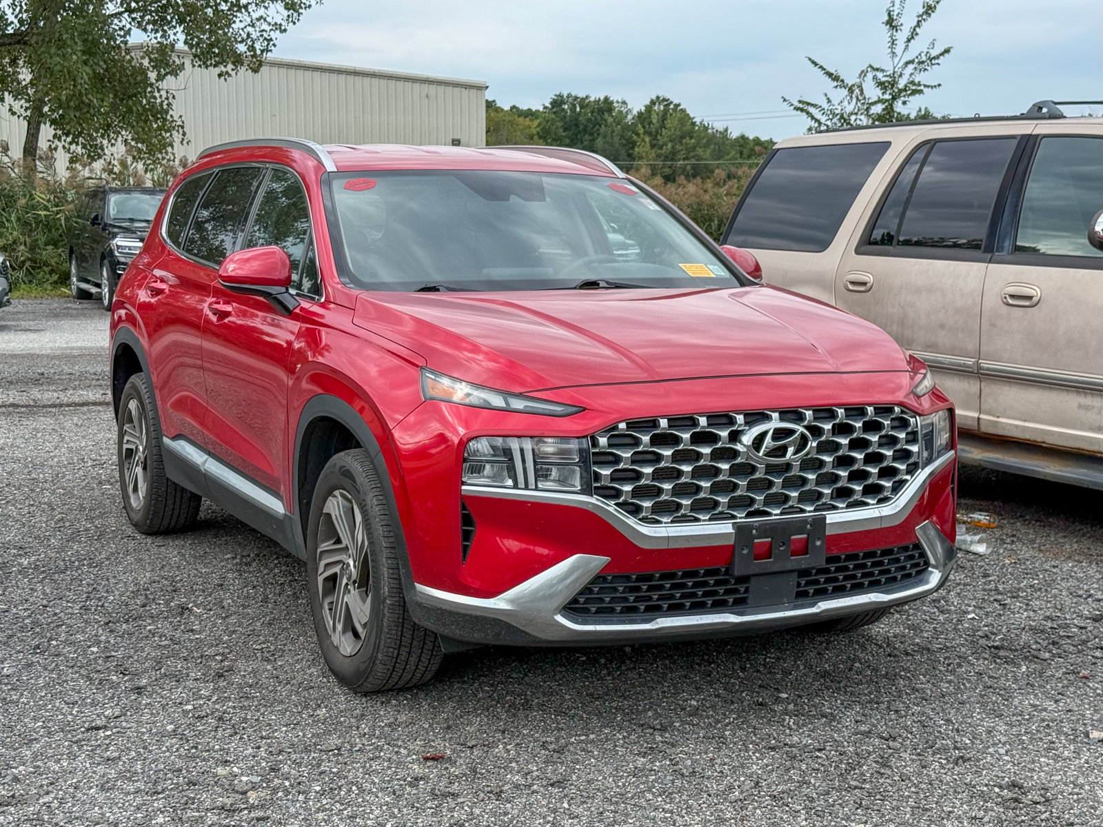 Photo view of 2021 Hyundai Santa Fe in Red